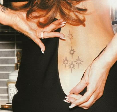 Victoria Caroline Beckham Star Tattoo On Back